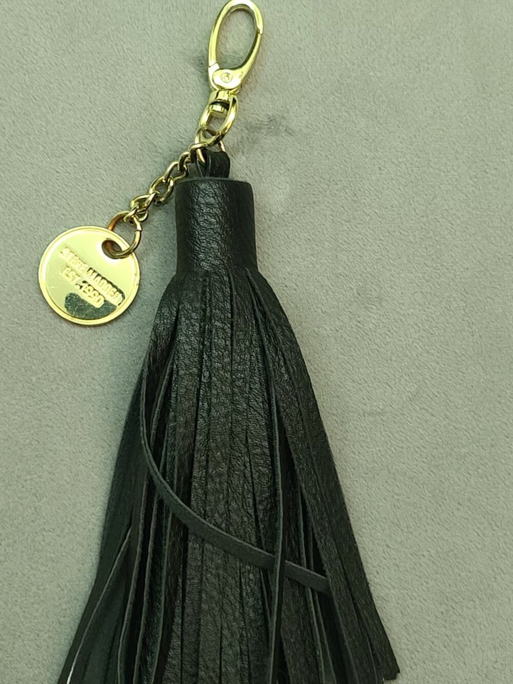 Steve Madden Black Faux Leather Tassel Bag Charm Keychain Gold Medallion
